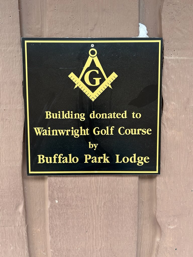 Plaque recording the building donated to Wainwright Golf Course by Buffalo Park Lodge in 2025